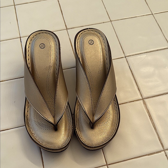 Brand new metallic gold sandals, size7 with a 2 inch heel. - Picture 1 of 4
